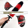 A hand holds a long reach soft bristle wheel cleaning brush, demonstrating its ability to clear obstacles.