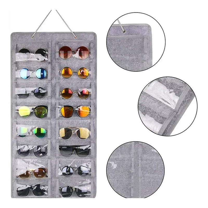 A gray felt organizer with sixteen slots for storing and hanging various pairs of eyeglasses.