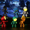 A collection of bendable robot night lights in various colors including black, blue, white, and red, displayed on a dark surf