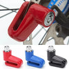 A set of red, blue, and black anti-theft disc brake locks for motorcycles and bikes.