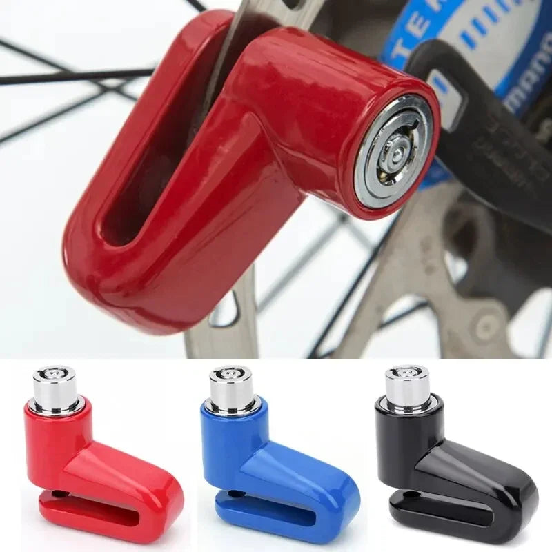 A set of red, blue, and black anti-theft disc brake locks for motorcycles and bikes.
