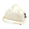 A cream-colored compact nylon gym bag with a light beige adjustable strap.