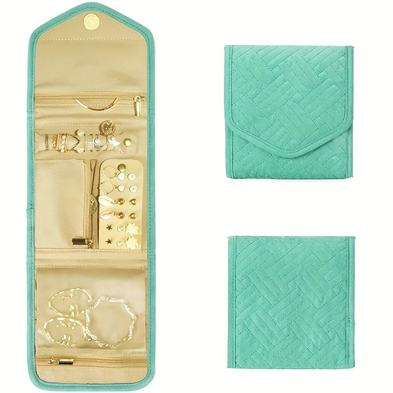 A foldable waterproof jewelry roll in light beige and teal, showing interior compartments and exterior fabric.
