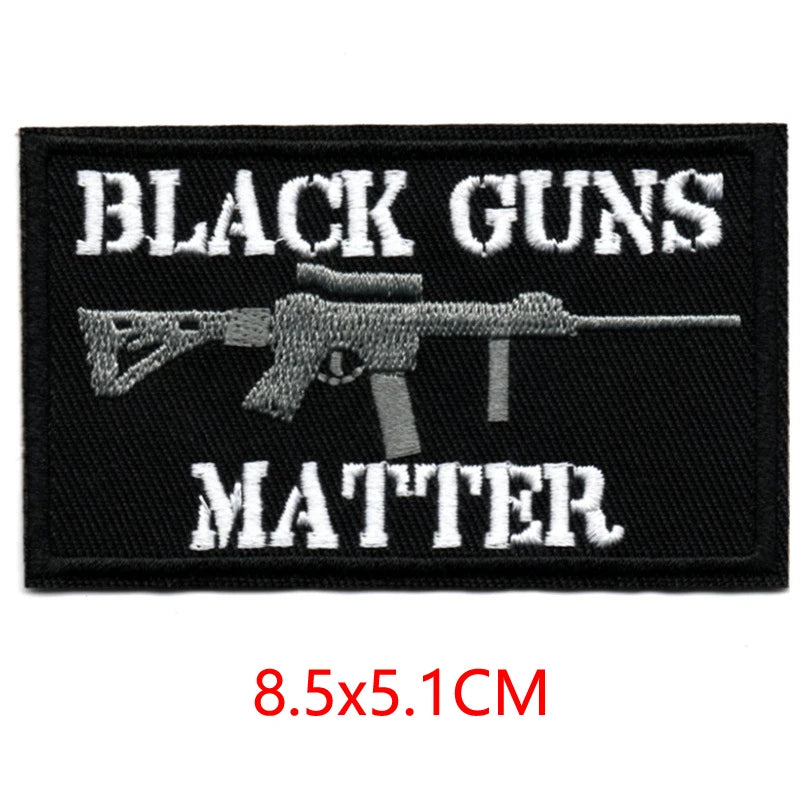 Black guns matter embroidered patch featuring a rifle silhouette and text