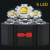 A black rechargeable headlamp with five yellow LED lights mounted on the front and a red switch.