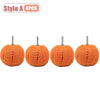 Four orange drill polishing sponge cones for wheels and automotive detailing.