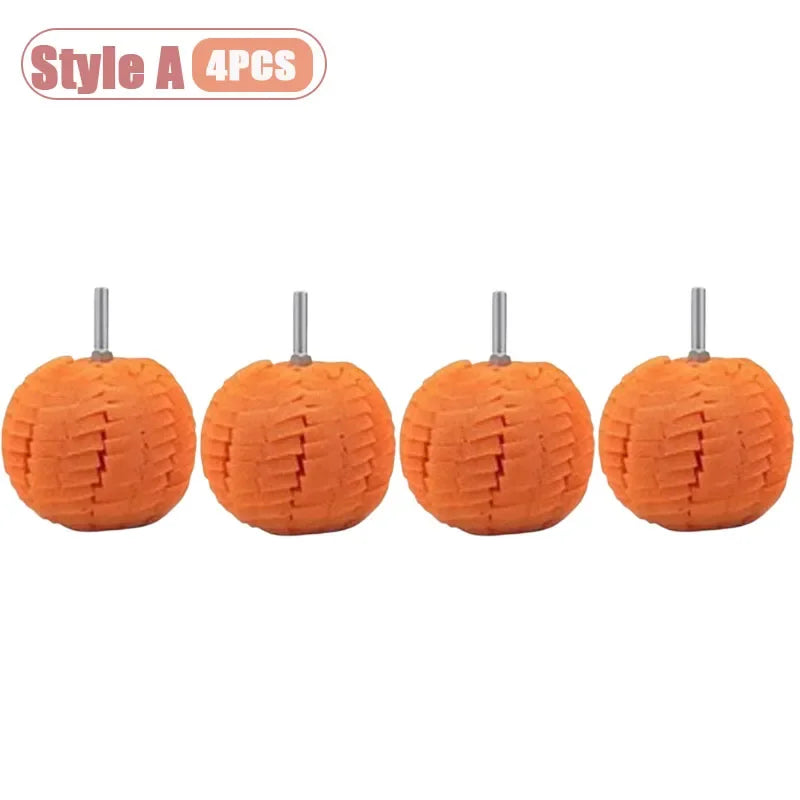 Four orange drill polishing sponge cones for wheels and automotive detailing.
