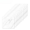 A set of rectangular white marble peel-and-stick tiles arranged in a diagonal pattern.