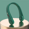 A teal hands-free bladeless neck fan with a digital display is shown resting on a round surface.