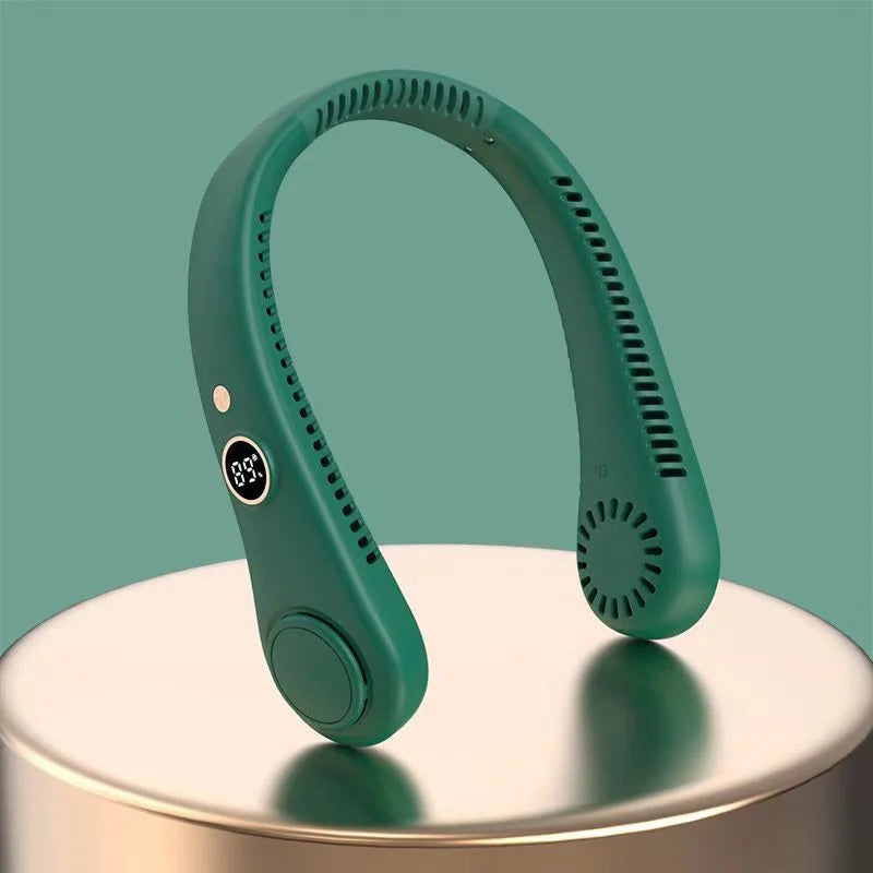 A teal hands-free bladeless neck fan with a digital display is shown resting on a round surface.