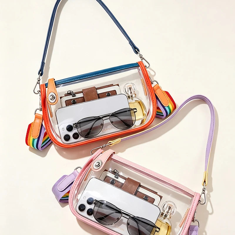 A clear PVC shoulder bag with an adjustable strap featuring a smartphone and sunglasses.