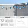 HDPE privacy screen with blue and white spherical lights strung across the top of a balcony or patio.