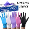 A variety of disposable nitrile gloves in blue, white, purple, pink, and black are displayed for sale.