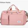 A pink large capacity travel duffel bag with an oblique display feature and a separate shoe compartment.