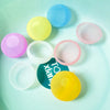 A collection of colorful reusable splash water balloons in various shades including blue, yellow, pink, and purple, arranged 
