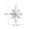 A silver octagonal star-shaped resin wall mirror with a geometric design.