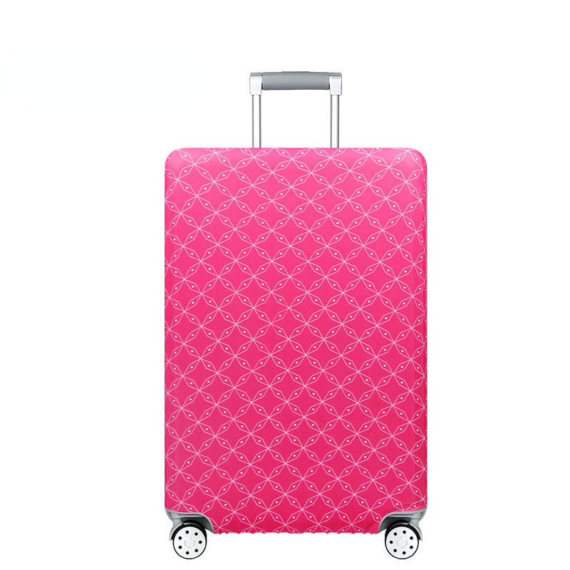 A pink stretchable luggage cover with a diamond pattern and silver handle and wheels.