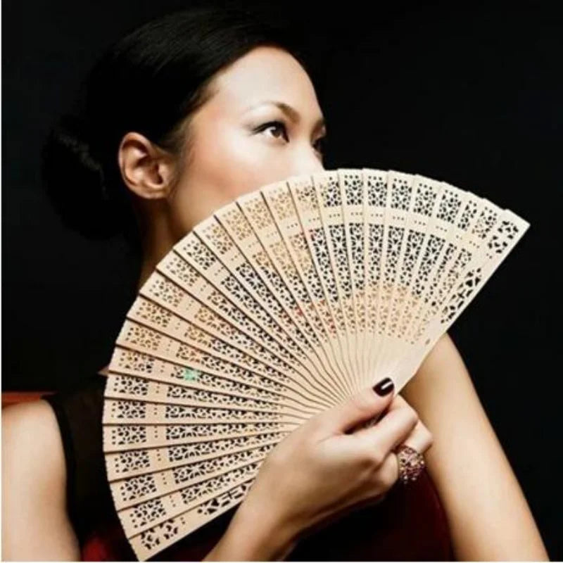 Handcrafted Sandalwood Folding Fan with Intricate Cutwork