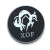 Black embroidered patch featuring a white fox silhouette with a hook and loop backing, labeled XOF.