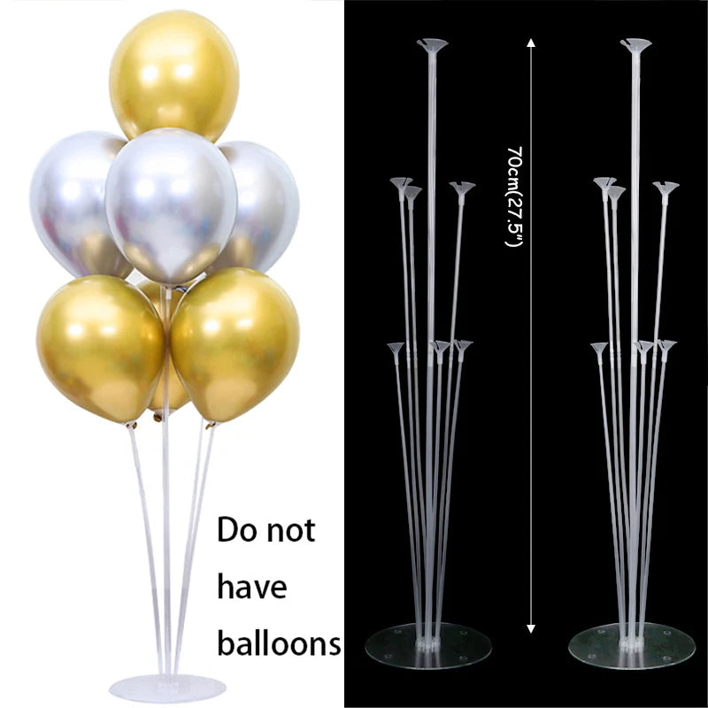 Clear plastic balloon column stands with gold and silver balloons for party decor