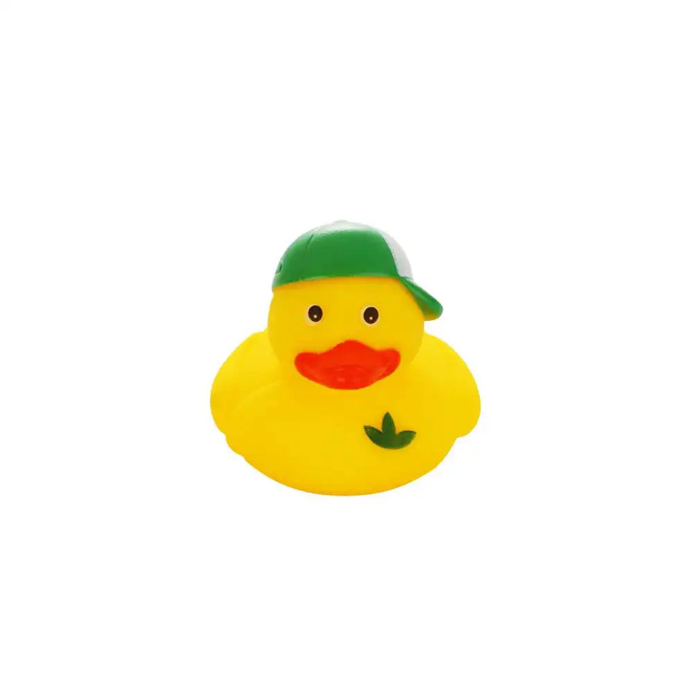 A bright yellow rubber duck toy with a green cap and orange beak.