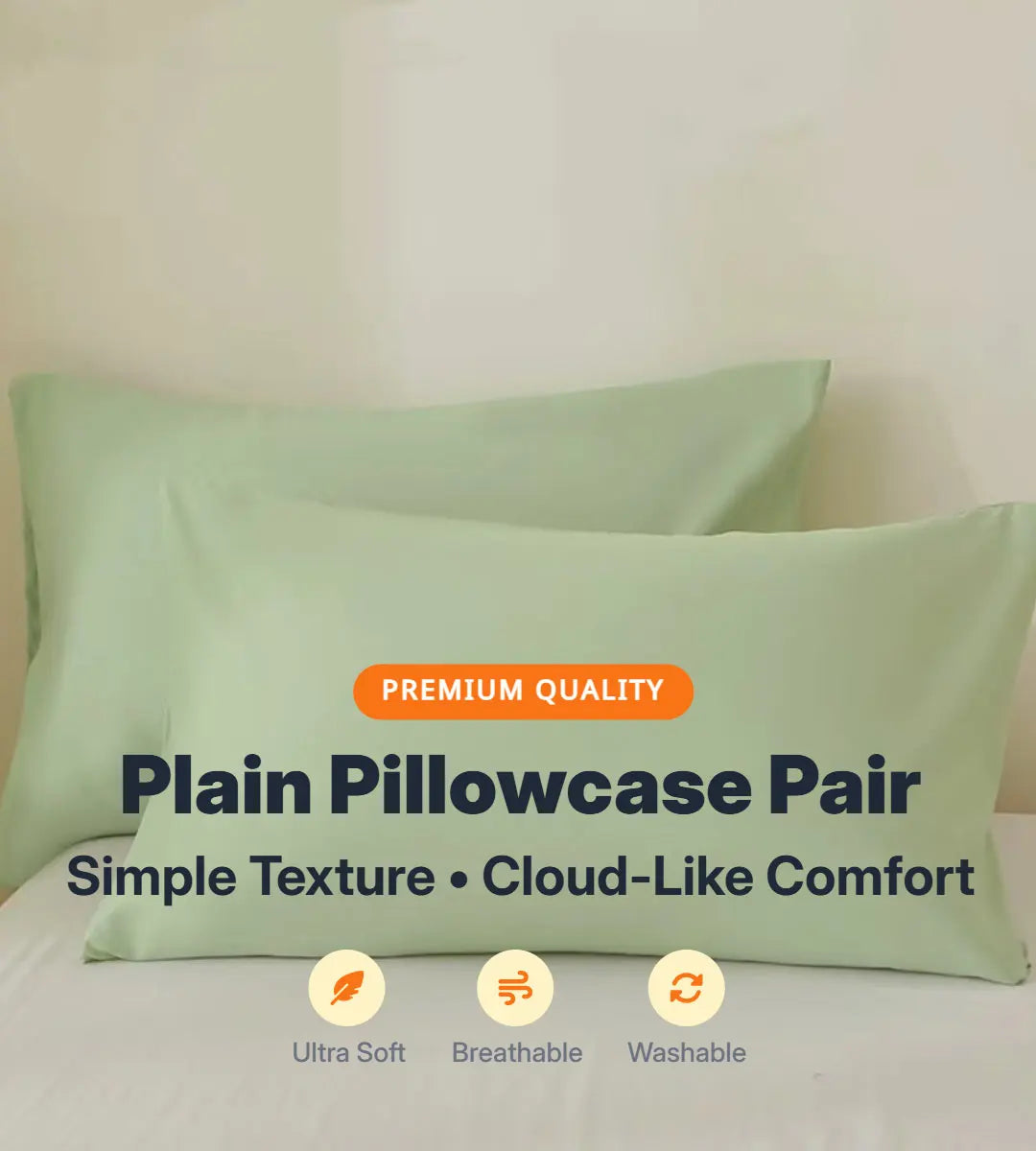 A pair of plain light green pillowcases showing simple texture and cloud-like comfort features