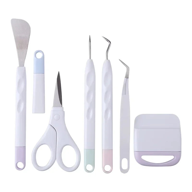 A set of six vinyl weeding and craft tools including a spatula, tweezers, scissors, and various precision implements.