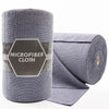Roll of gray microfiber cloth cleaning wipes with an hexagonal label