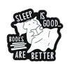 Black enamel pin featuring a sleeping elephant with text that reads Sleep is good books are better