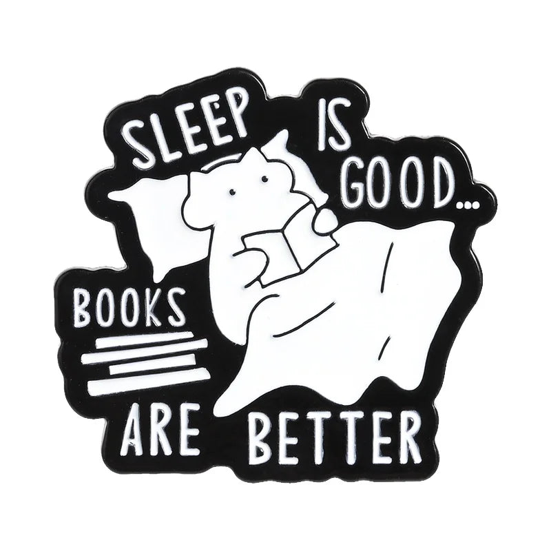 Black enamel pin featuring a sleeping elephant with text that reads Sleep is good books are better