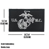 Black embroidered tactical patch featuring an eagle and a marine silhouette with U.S. and M.C. text.