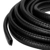Black flexible rubber U-channel edge protector trim coiled and curved