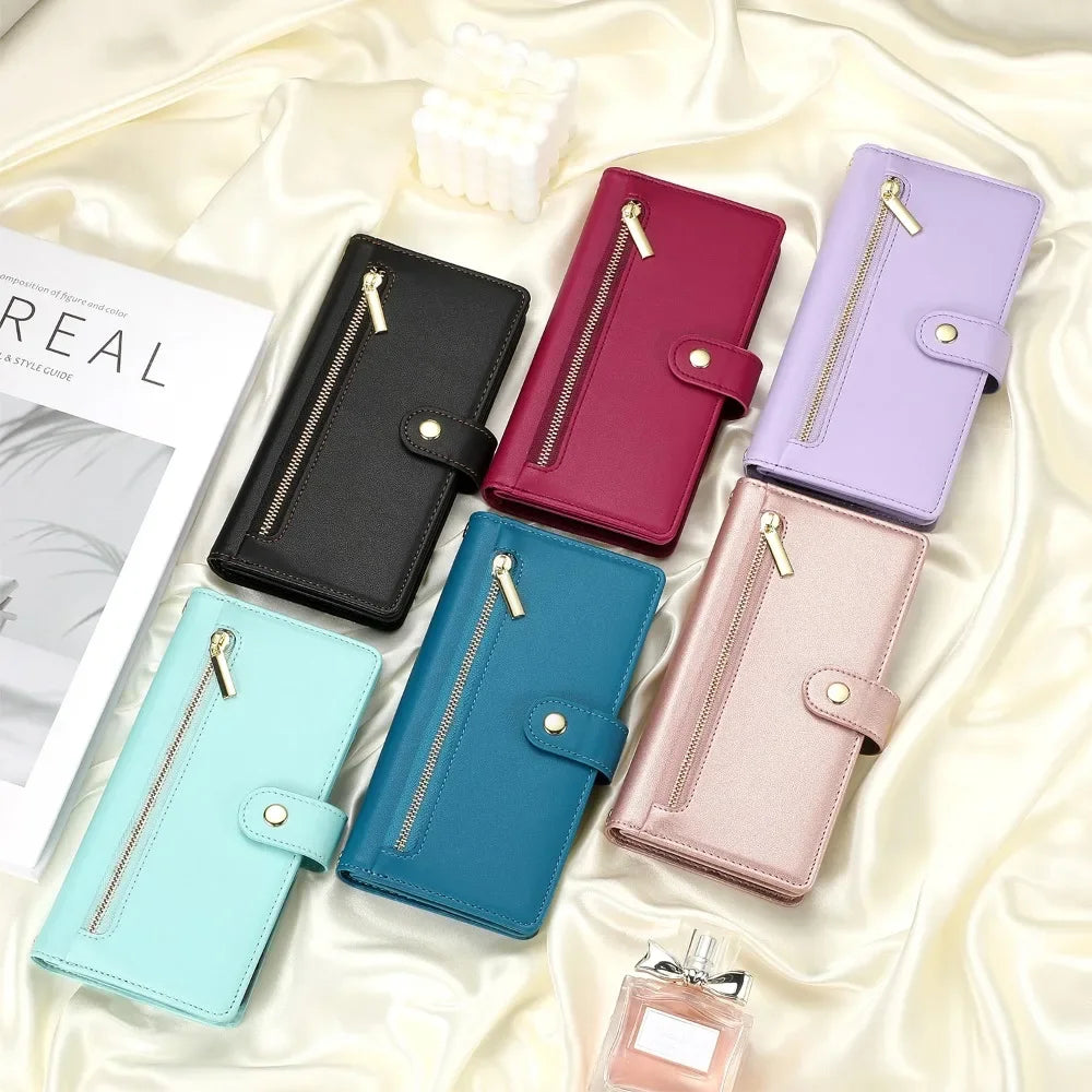A collection of purple, pink, and teal crossbody phone wallets with zipper closures displayed on a satin fabric.