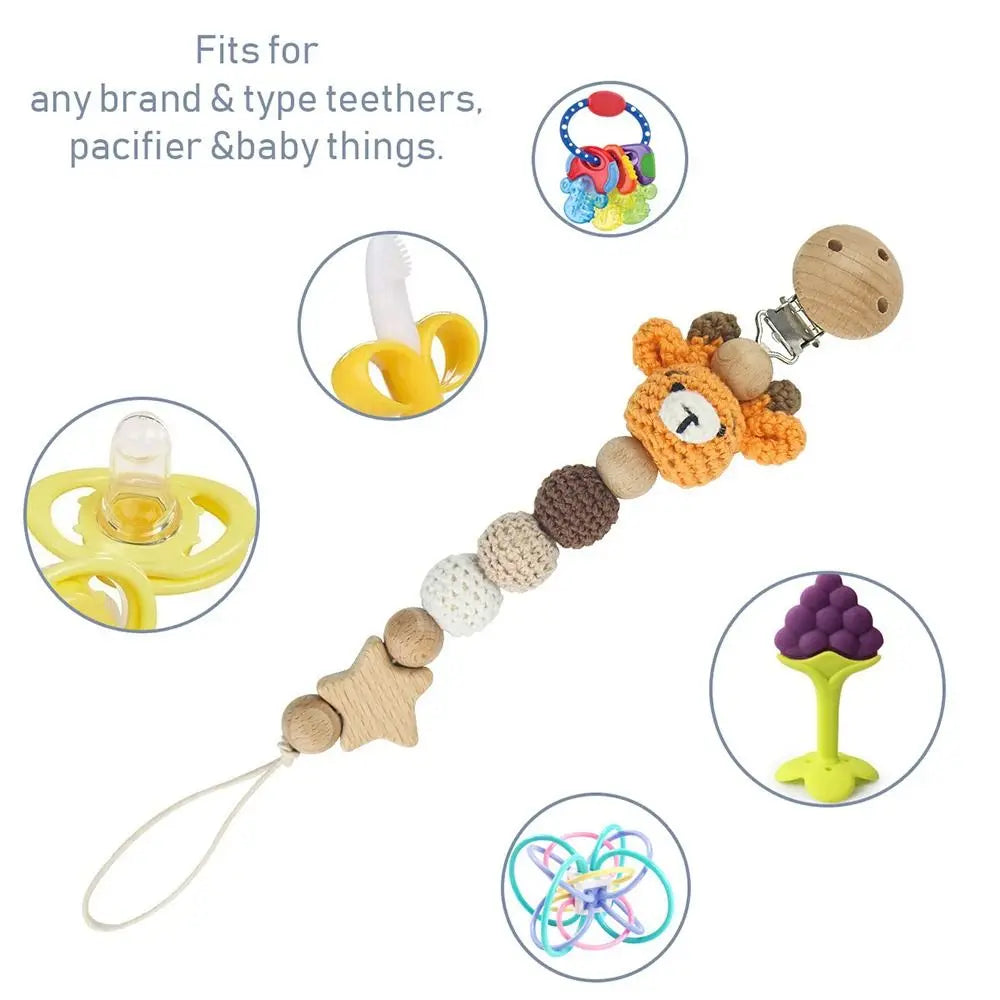 A wooden pacifier clip with crochet beads and a chain for baby teething soother.