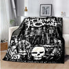 A black fleece throw blanket featuring a graphic design of the My Chemical Romance band members and skull imagery.