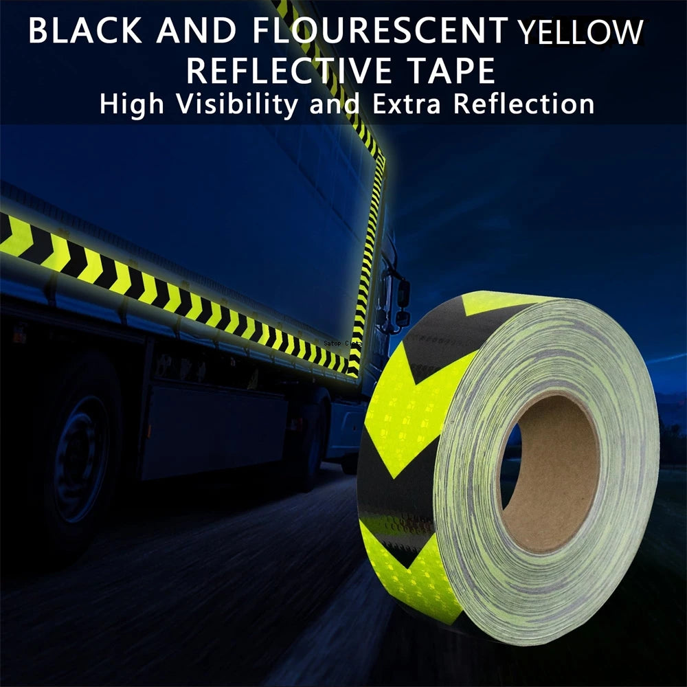 Roll of black and fluorescent yellow reflective tape used for high visibility and extra reflection on a truck