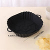 Black reusable square air fryer silicone liner with a ribbed edge and handle.