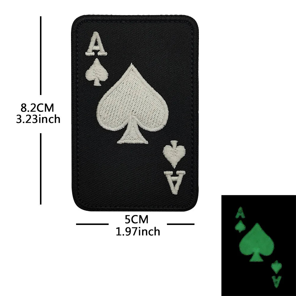 Black embroidered patch featuring the Ace of Spades, three of Spades, and Jack of Spades symbols.