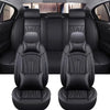 Black full coverage PU leather car seat covers shown in the interior of a vehicle.