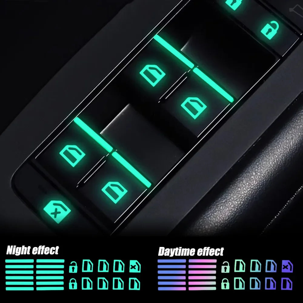 Close-up of a car window switch featuring night and daytime effect stickers.