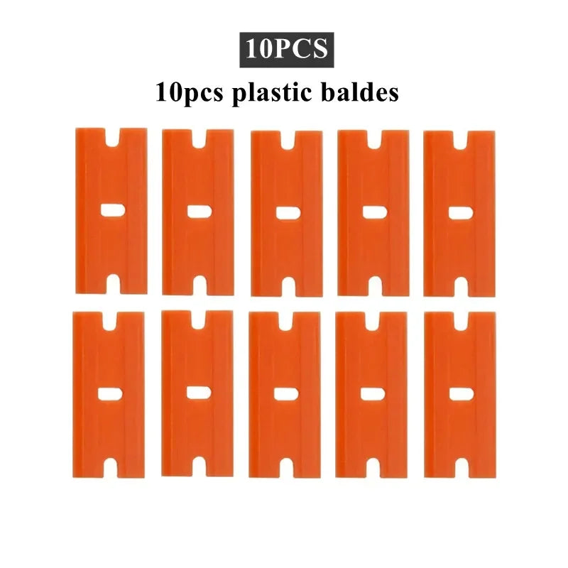 Ten orange plastic razor blades arranged in a grid for replacement.