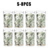 Eight clear acrylic piggy banks filled with US currency bills and coins.