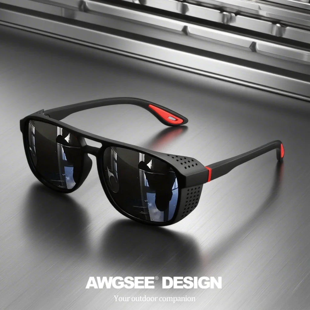 Black polarized sports sunglasses resting on a dark gray surface with a metallic background.