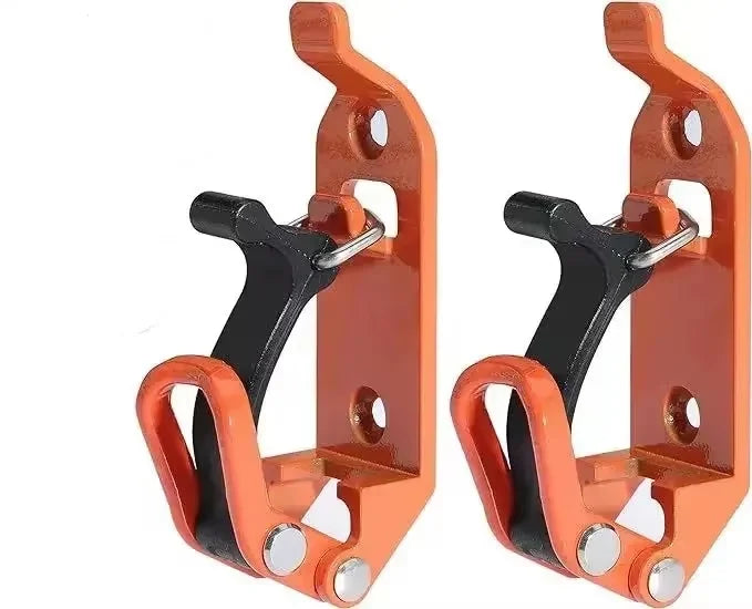 A pair of heavy-duty orange wall mount tool holders designed for securing shovels, axes, and other tools.