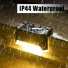 A solar deck light illuminates a wooden surface, demonstrating its IP44 waterproof feature.