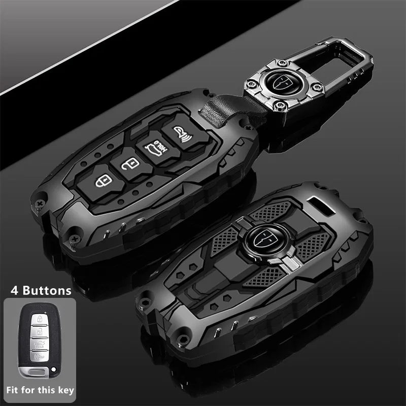 A black protective key fob cover with four buttons is shown in a close-up view.