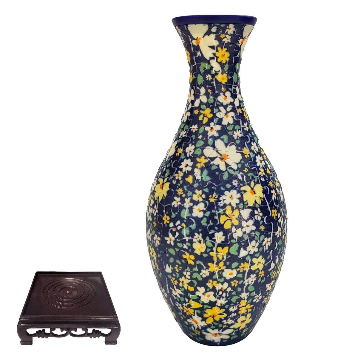 A blue and yellow floral ceramic vase with a narrow neck and bulbous body, displayed on a dark wooden stand.