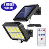 A solar powered security light with a solar panel and remote control is shown.