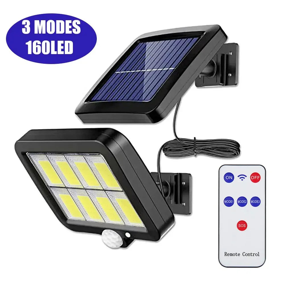 A solar powered security light with a solar panel and remote control is shown.