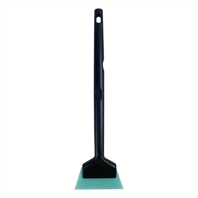A black tool with a long handle and a green plastic blade used for car window film installation or snow shoveling.